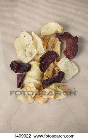 Directly above shot of potato and beetroot chips on table View Large Photo Image Stock Image - Directly above shot of potato and beetroot chips on table. Fotosearch