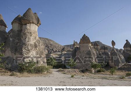 Stock Image - Eroded rock formations against clear blue sky. Fotosearch