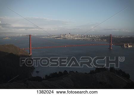 Golden Gate Bridge with cityscape in background View Large Photo Image Picture - Golden Gate Bridge with cityscape in background. Fotosearch