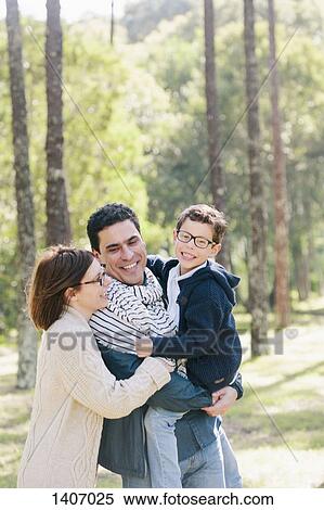 Happy family in forest View Large Photo Image Stock Photography - Happy family in forest. Fotosearch