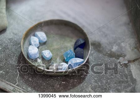 High angle view of mineral stones in bowl View Large Photo Image Stock Photography - High angle view of mineral stones in bowl. Fotosearch
