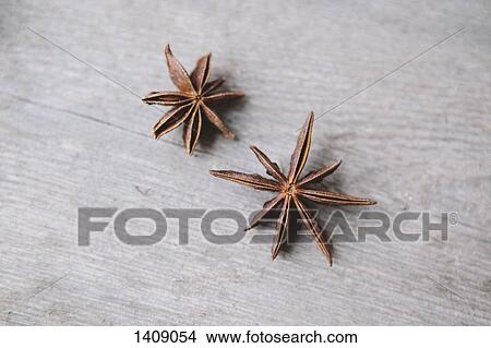 High angle view of star anise on wooden table View Large Photo Image Picture - High angle view of star anise on wooden table. Fotosearch