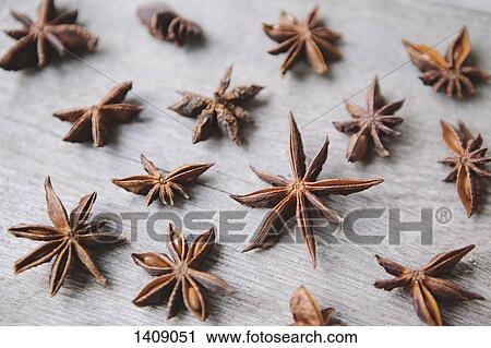 High angle view of star anise on wooden table View Large Photo Image Stock Image - High angle view of star anise on wooden table. Fotosearch