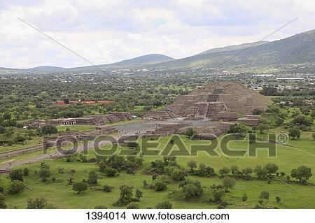 High angle view of Sun Pyramid and landscape against cloudy sky View Large Photo Image Picture - High angle view of Sun Pyramid and landscape against cloudy sky. Fotosearch