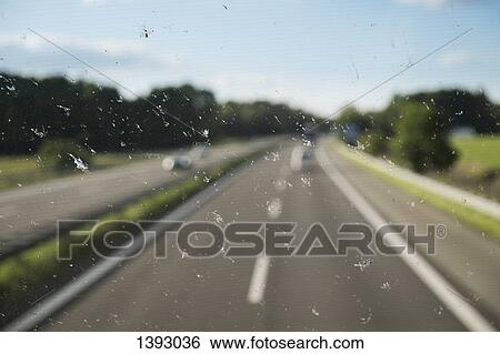 Highway seen through glass View Large Photo Image Stock Photograph - Highway seen through glass. Fotosearch