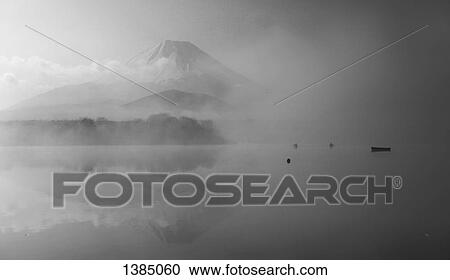 Stock Image - "Lake and Mt Fuji in foggy weather, Japan". Fotosearch
