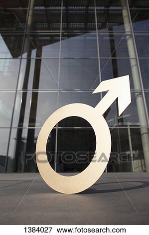Male symbol outside office building View Large Photo Image Stock Photo - Male symbol outside office building. Fotosearch