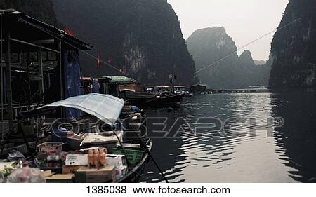 "Market boats at Halong bay, Vietnam" View Large Photo Image Stock Photo - "Market boats at Halong bay, Vietnam". Fotosearch
