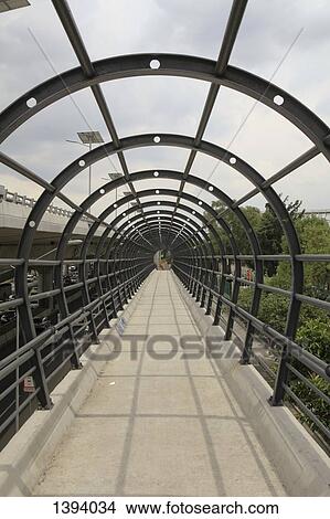 Metallic arches on bridge against sky View Large Photo Image Picture - Metallic arches on bridge against sky. Fotosearch