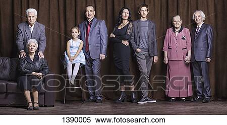 Organized group photo of well-dressed family View Large Photo Image Stock Photography - Organized group photo of well-dressed family. Fotosearch