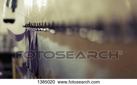 Papers hanging on hooks View Large Photo Image Stock Image - Papers hanging on hooks. Fotosearch