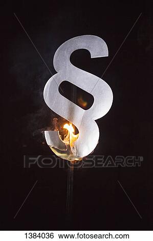 Paragraph symbol on pole burning at night View Large Photo Image Stock Photograph - Paragraph symbol on pole burning at night. Fotosearch