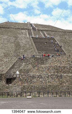 Stock Photo - Pyramid of the Sun against cloudy sky. Fotosearch