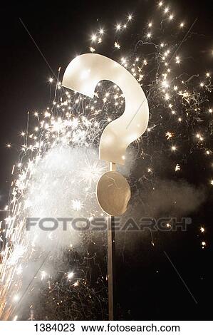 Question mark on pole with fireworks at night View Large Photo Image Stock Image - Question mark on pole with fireworks at night. Fotosearch