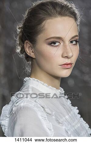 Side view portrait of beautiful young woman View Large Photo Image Picture - Side view portrait of beautiful young woman. Fotosearch