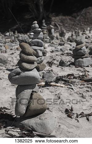 Stack of pebbles at beach View Large Photo Image Stock Photography - Stack of pebbles at beach. Fotosearch