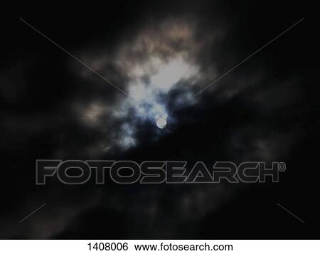 Storm clouds covering moon at night View Large Photo Image Stock Photograph - Storm clouds covering moon at night. Fotosearch