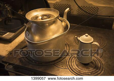 Tea kettle on stove View Large Photo Image Stock Photo - Tea kettle on stove. Fotosearch