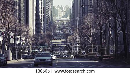 "Vehicles moving on city street, Seoul, South Korea" View Large Photo Image Stock Image - "Vehicles moving on city street, Seoul, South Korea". Fotosearch