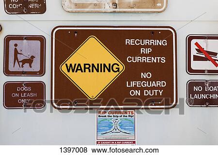 Warning signs on wall View Large Photo Image Stock Photo - Warning signs on wall. Fotosearch