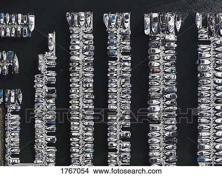 Aerial view boats moored in sunny harbor, Los Angeles, California, USA View Large Photo Image Picture - Aerial view boats moored in sunny harbor, Los Angeles, California, USA. Fotosearch