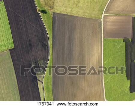 Aerial view green and brown agricultural fields, Donaueschingen, Baden-Wuerttemberg, Germany View Large Photo Image Stock Image - Aerial view green and brown agricultural fields, Donaueschingen, Baden-Wuerttemberg, Germany. Fotosearch