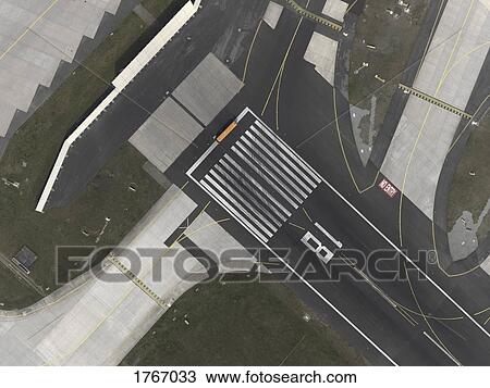 Aerial view of tarmac at airport View Large Photo Image Stock Image - Aerial view of tarmac at airport. Fotosearch