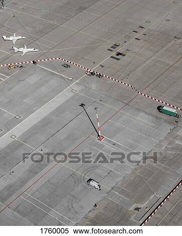 Aerial view private airplanes parked on tarmac at airport View Large Photo Image Stock Photography - Aerial view private airplanes parked on tarmac at airport. Fotosearch