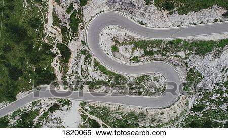 Aerial view road winding through Drei Zinnen Nature Park, South Tyrol, Italy View Large Photo Image Stock Photography - Aerial view road winding through Drei Zinnen Nature Park, South Tyrol, Italy. Fotosearch