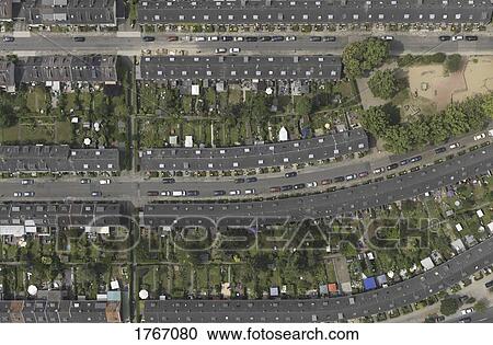 Stock Image - Aerial view row house rooftops near Cologne, North Rhine-Westphalia, Germany. Fotosearch