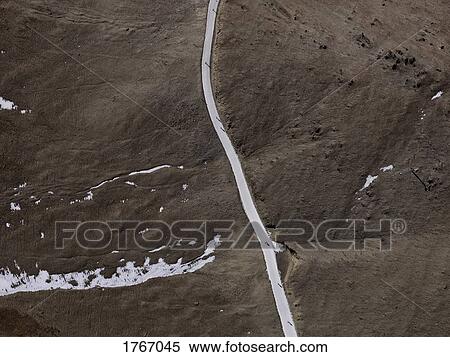 Aerial view snowy track on brown mountainside, Ischgl, Tyrol, Austria View Large Photo Image Stock Photography - Aerial view snowy track on brown mountainside, Ischgl, Tyrol, Austria. Fotosearch