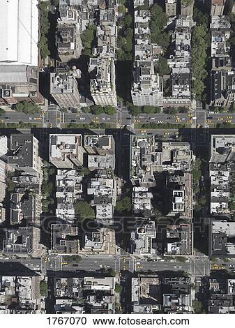 Aerial view sunny highrise rooftops, New York City, New York, USA View Large Photo Image Stock Image - Aerial view sunny highrise rooftops, New York City, New York, USA. Fotosearch