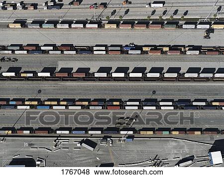 Stock Photo - Aerial view trains in sunny shunting yard, Los Angeles, California, USA. Fotosearch