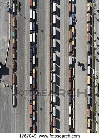 Stock Photo - Aerial view trains in sunny shunting yard, Los Angeles, California, USA. Fotosearch
