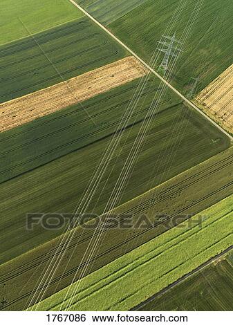 Aerial view vibrant green agricultural crops, Donaueschingen, Baden-Wuerttemberg, Germany View Large Photo Image Stock Photograph - Aerial view vibrant green agricultural crops, Donaueschingen, Baden-Wuerttemberg, Germany. Fotosearch