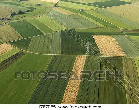 Aerial view vibrant green agricultural crops, Donaueschingen, Baden-Wuerttemberg, Germany View Large Photo Image Stock Photography - Aerial view vibrant green agricultural crops, Donaueschingen, Baden-Wuerttemberg, Germany. Fotosearch