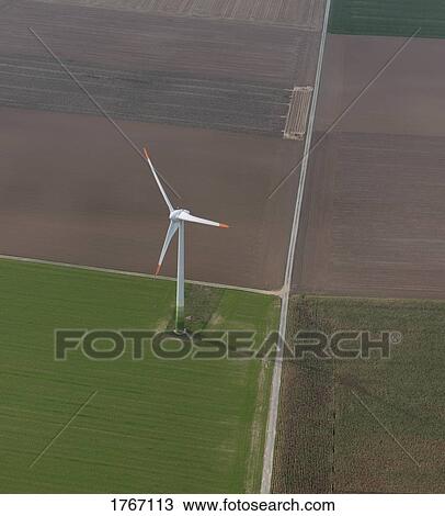 Stock Image - Aerial view wind turbine in agricultural field near Frankfurt, Hessen, Germany. Fotosearch