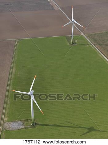 Aerial view wind turbines in agricultural fields near Frankfurt, Hessen, Germany View Large Photo Image Stock Image - Aerial view wind turbines in agricultural fields near Frankfurt, Hessen, Germany. Fotosearch