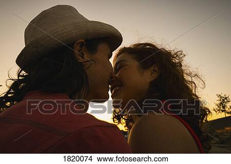 Affectionate couple kissing View Large Photo Image Picture - Affectionate couple kissing. Fotosearch