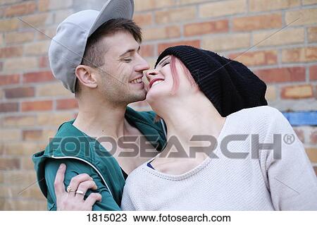 Stock Image - Affectionate, happy young couple. Fotosearch