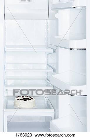 Black forest cake in open, empty white refrigerator View Large Photo Image Stock Image - Black forest cake in open, empty white refrigerator. Fotosearch