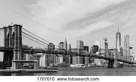 Brooklyn Bridge Over East River in Manhattan against sky, New York City, New York, USA View Large Photo Image Stock Image - Brooklyn Bridge Over East River in Manhattan against sky, New York City, New York, USA. Fotosearch