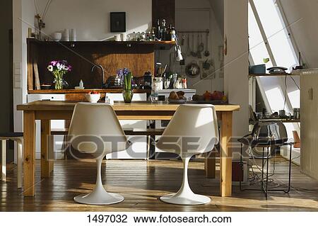 Chairs and table in modern kitchen at home View Large Photo Image Stock Image - Chairs and table in modern kitchen at home. Fotosearch