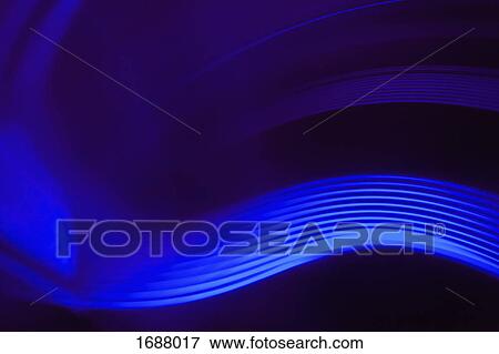 Stock Photo - Close-up abstract image of vibrant blue light trails against black background. Fotosearch