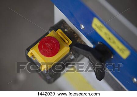 Close-up, high angle view of stop button of sliding table saw in workshop View Large Photo Image Stock Photo - Close-up, high angle view of stop button of sliding table saw in workshop. Fotosearch