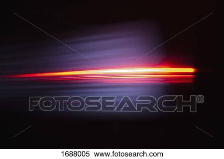 Close-up of abstract red light trail against black background View Large Photo Image Stock Photography - Close-up of abstract red light trail against black background. Fotosearch