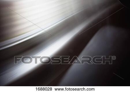 Stock Photo - Close-up of abstract silver light patterns. Fotosearch