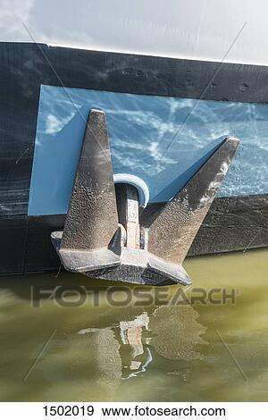 Close-up of anchor on ship moored at harbor on lake View Large Photo Image Stock Photo - Close-up of anchor on ship moored at harbor on lake. Fotosearch