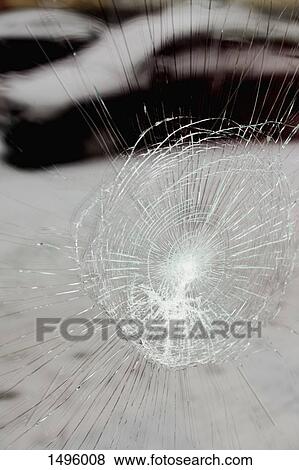 Stock Photo - Close-up of broken windshield. Fotosearch