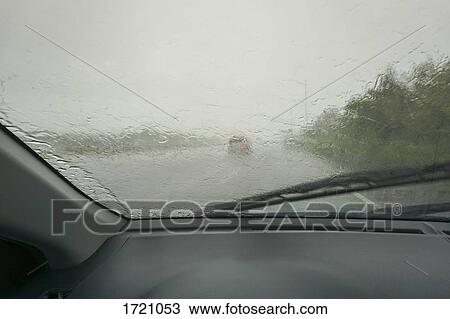 Close-up of car windshield during rain View Large Photo Image Stock Image - Close-up of car windshield during rain. Fotosearch